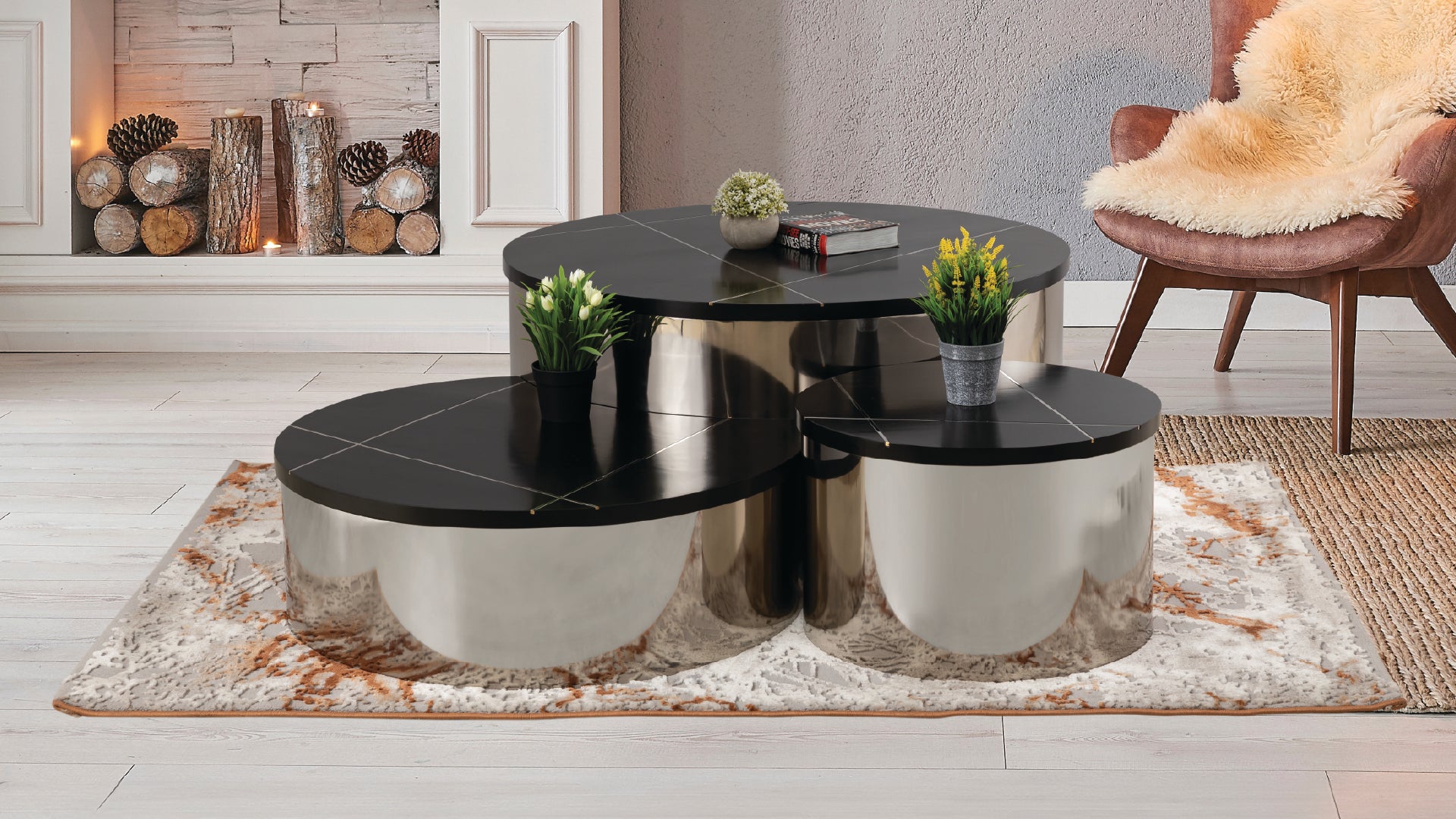 Orvani 3-piece nesting coffee table set with a circular silhouette and silver bases in a modern living room setting.