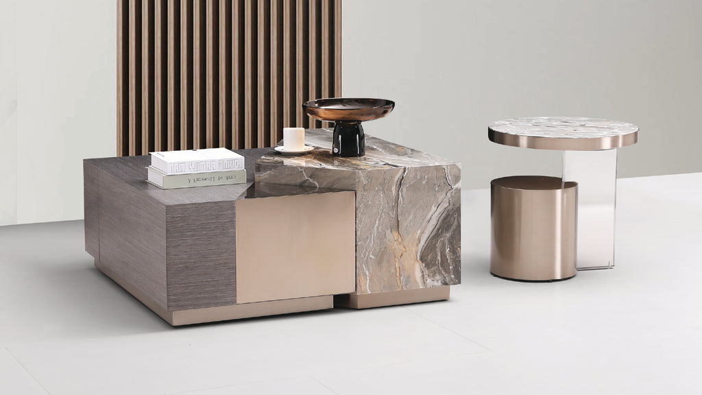 Viresta luxury furniture set featuring a block-style marble top coffee table with natural veining and a matching cylindrical end table.