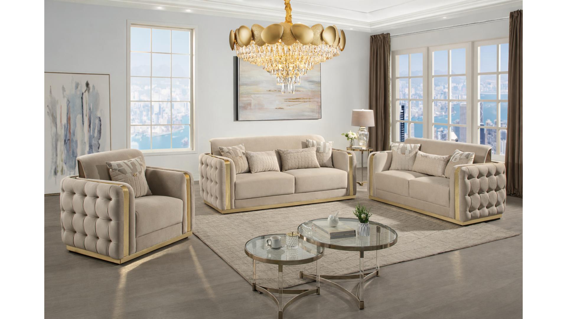 Morvix luxury living room furniture set featuring a contemporary tufted sofa, loveseat, and armchair in a soft neutral-toned fabric with sleek gold frame accents