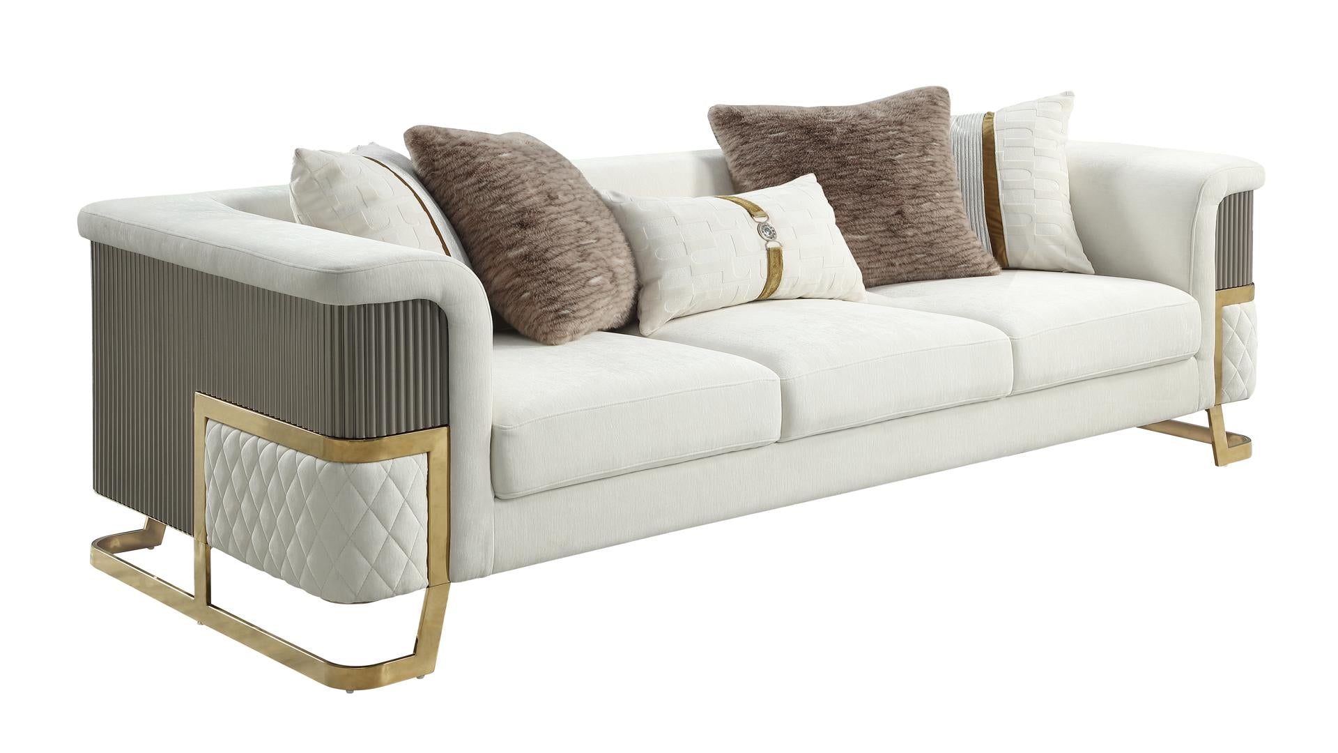 Zaylen modern luxury sofa in cream white bouclé textured fabric featuring an architectural gold geometric metal frame base and accent pillows