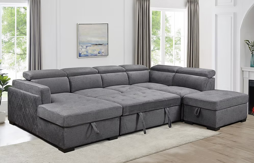 Natali modern soft grey fabric left-hand facing sectional sofa bed featuring adjustable headrests, an open bed configuration, and a lift-up storage ottoman