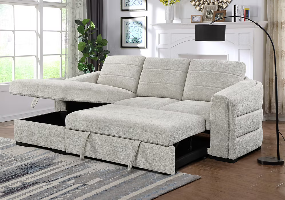 Victoria left-hand facing sectional sofa bed in light grey bouclé textured fabric featuring horizontal tufting, a rounded backrest, pull-out bed mechanism, and open storage chaise