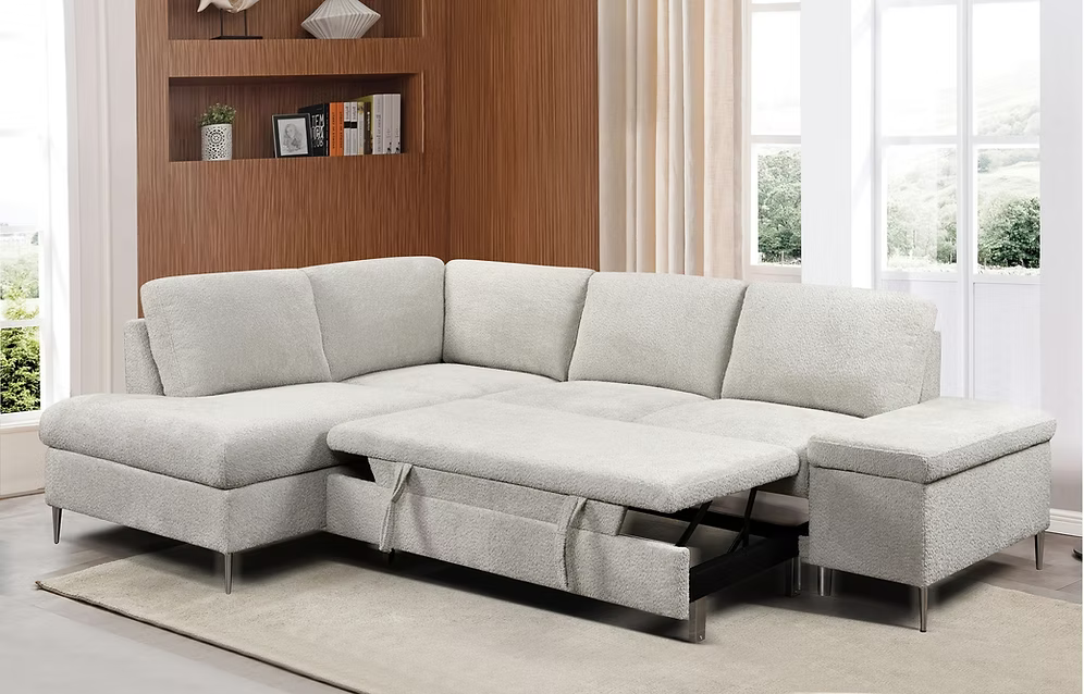 Ayla modern left-hand facing sectional sofa bed in grey bouclé textured fabric featuring an integrated pull-out bed mechanism and a lift-up storage chaise bench