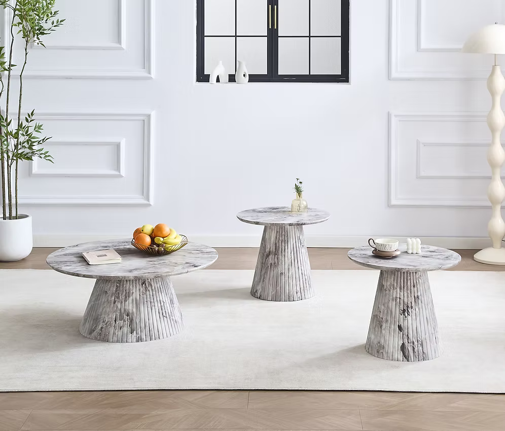 Mia modern 3-piece living room table set featuring a round coffee table and two nested end tables with grey marble look finishes and fluted cone pedestal bases