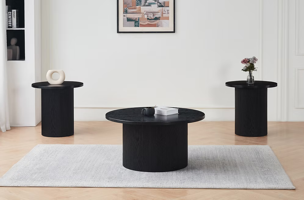 Ella contemporary 3-piece living room furniture set featuring a round black wood coffee table and matching fluted pedestal end tables