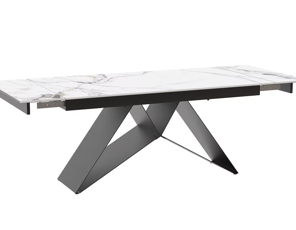 Lilly extendable dining table with a white vein-matched sintered stone marble top and an X-shape black steel base shown in a contemporary dining room