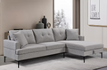 Monti modern right-hand facing sectional sofa bed in soft grey fabric featuring button tufted back cushions, black metal legs, and a pull-out guest bed
