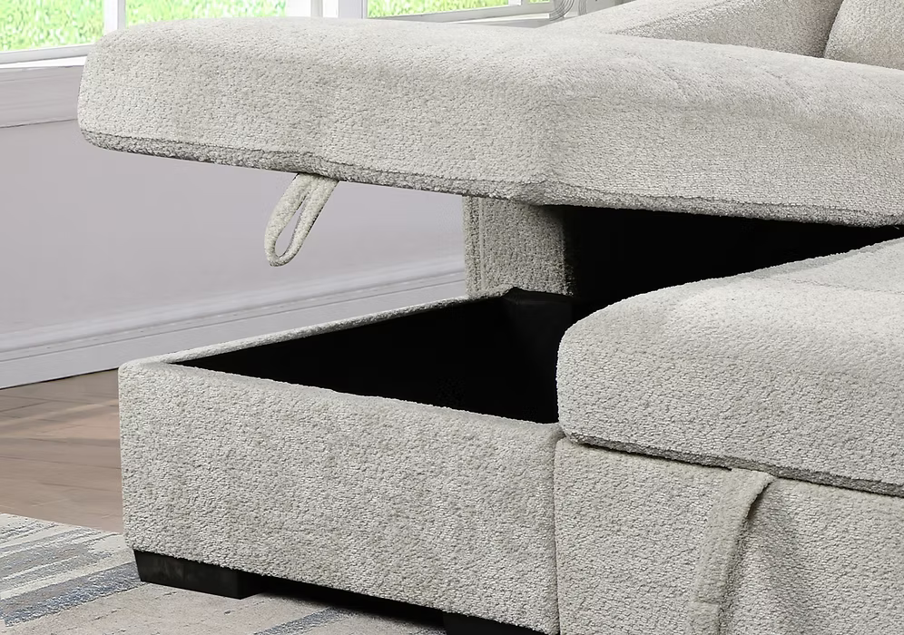 Victoria left-hand facing sectional sofa bed in light grey bouclé textured fabric featuring horizontal tufting, a rounded backrest, pull-out bed mechanism, and open storage chaise