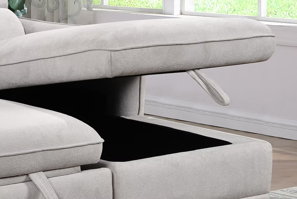Nina modern right-hand facing sectional sofa bed in light grey fabric featuring adjustable headrests, a tufted seat design, and an open lift-up storage chaise